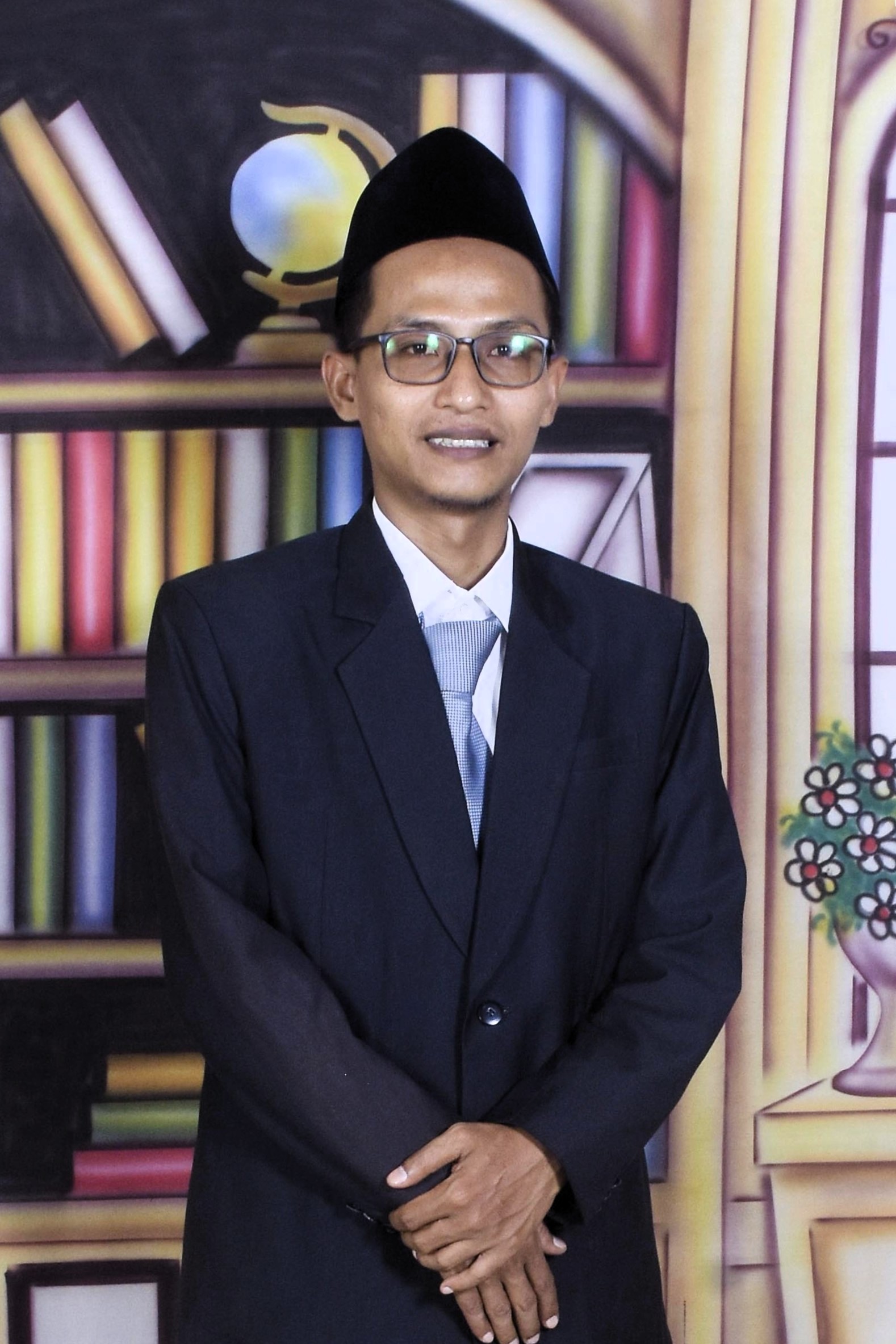 Muhammad Hamdan, S. Pd. I.